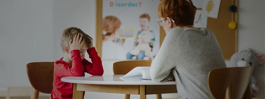 Frustrated child with a teacher