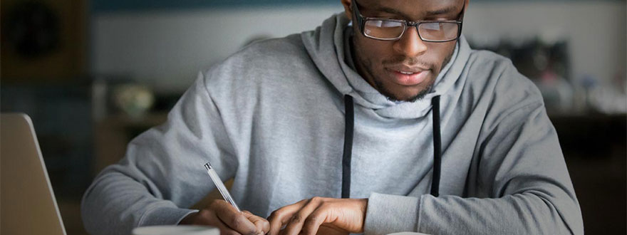 Man writing notes