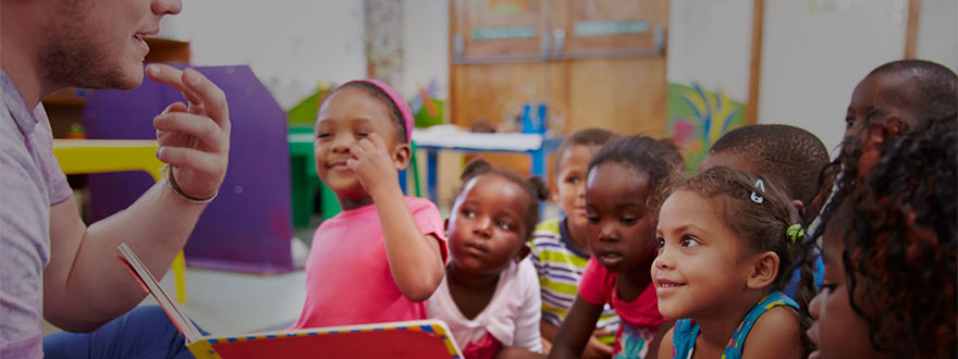 Group of school kids lip-reading a teacher