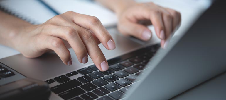 Hands on laptop